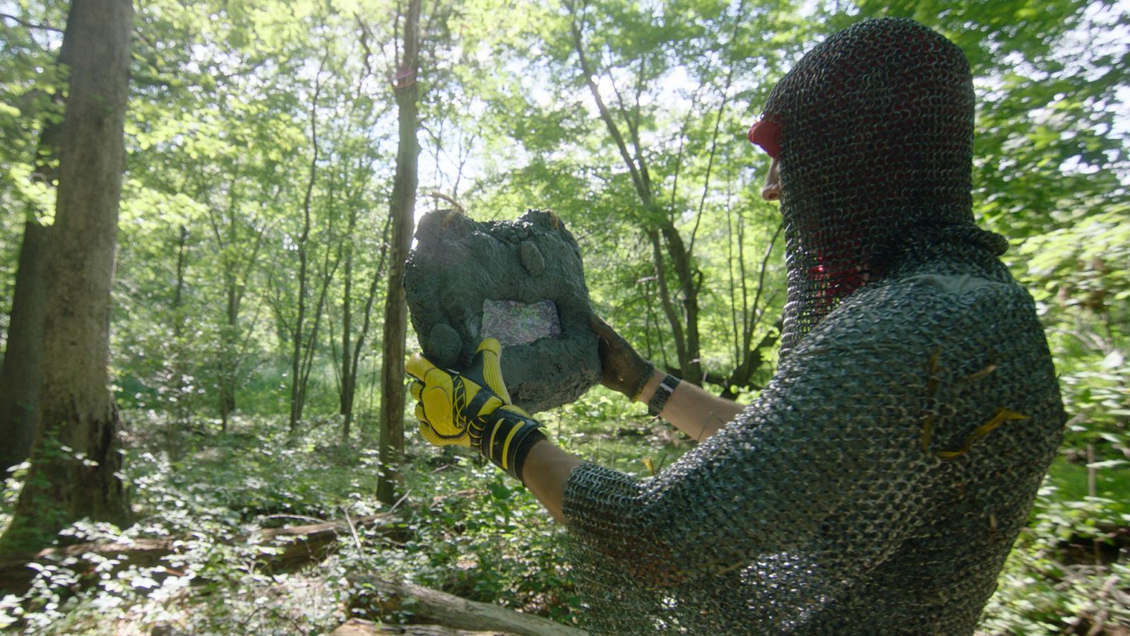 Film still from "Your Final Meditation" currently in post-production. “Your Final Meditation,” is a long form guided meditation structured as a series of video game levels. In this level, a knight character embarks on the impossible task of 3D scanning an entire forest. Filmed with a steadicam we sought to create hyper smooth images that look and feel like a 3rd person point of view in a video game. Combining live action footage, 3D scans, and digital animations this scene moves between the character documenting the world and the scans they are creating. As large tech companies seek to recreate the “real” world in the metaverse, what is lost in the process? After encountering a strange object in the forest the knight must face his imminent demise. The forest does not want to be scanned.
