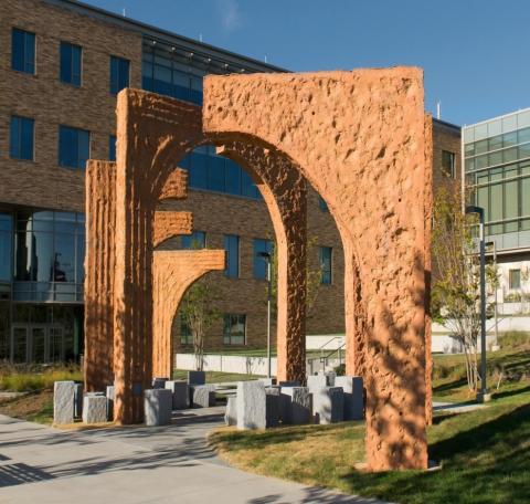 Arches in various sizes outside of a school building