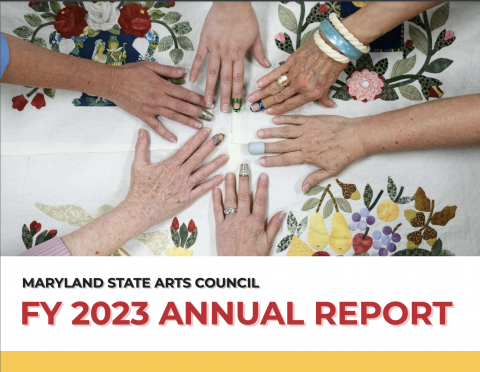 MSAC FY23 Annual Report Cover Image, hands outstreached above a Baltimore block quilt