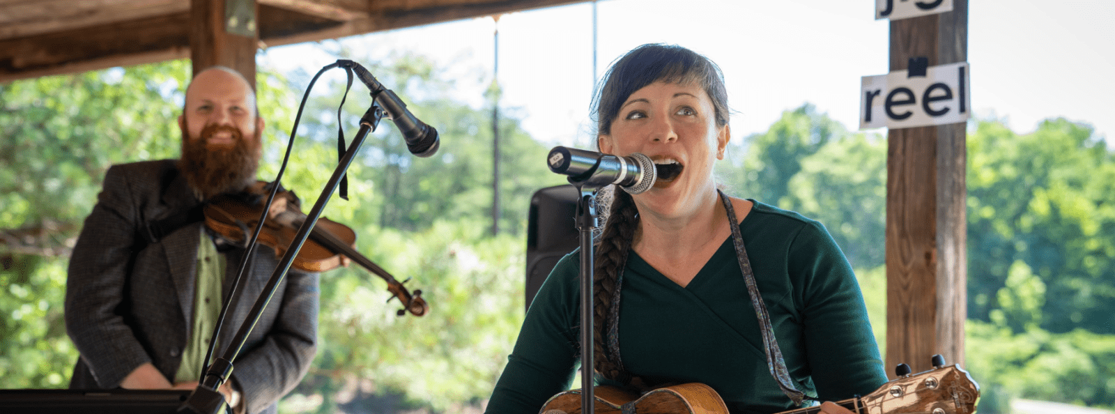 Teaching artist group performing in outdoor pavilion 