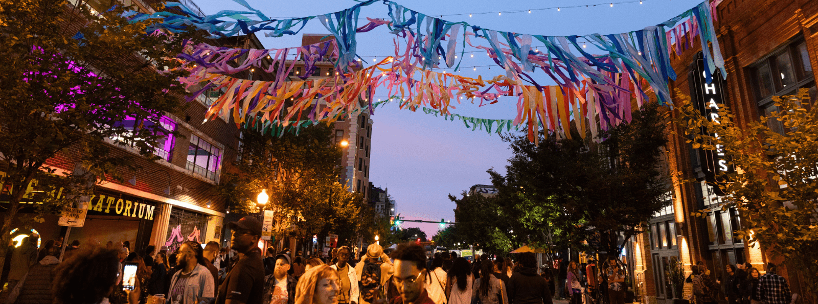 Station North Arts District crowd at nighttime event