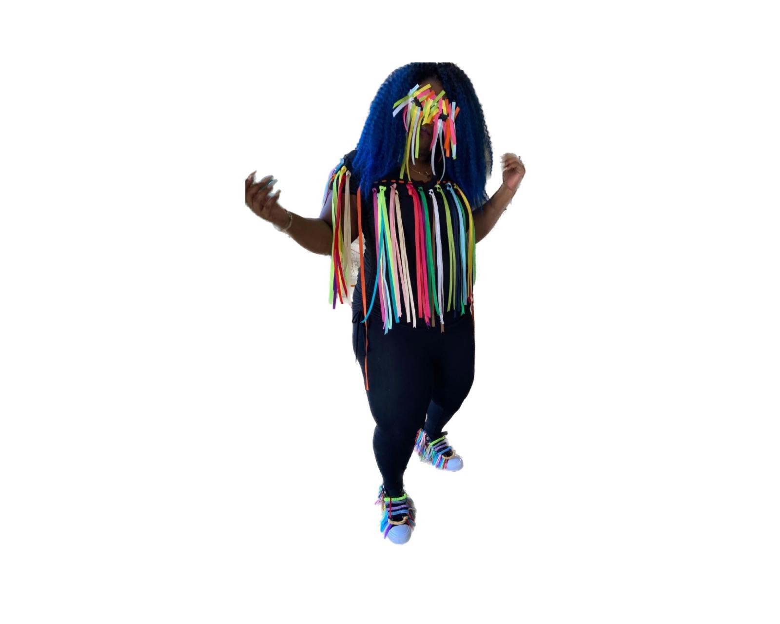 Carnival attire is inspired by the beats in the Spanish Reggeaton music that I grew up hearing in Panama. 
In the Universal Carnival Art and Dance workshops, we travel through music and nostalgia, creating colorful costumes and props to dance comparsa style.