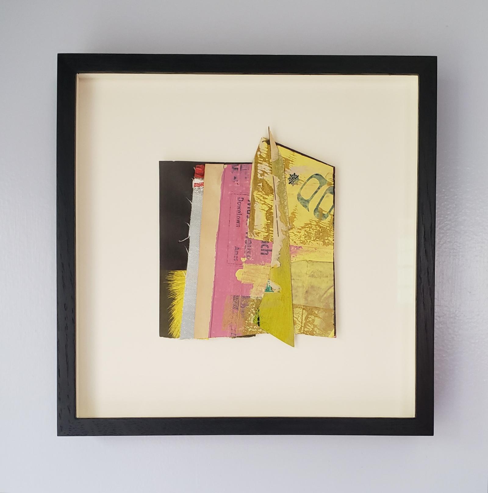 Downtown Ames is a collage made with pieces of scraps of printmaking and found papers.