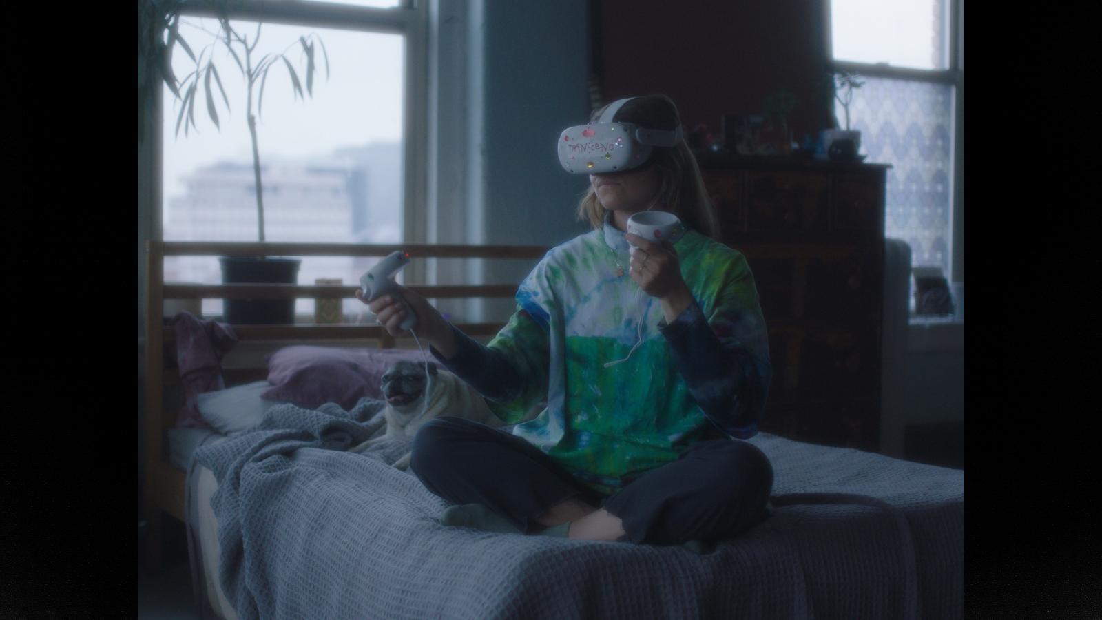 “Your Final Meditation,” cuts between 12 levels of a fictional video game and the player of the game, Jodiiie. Jodiiie is quarantined in a cluttered, communal warehouse on the edge of a post-industrial city. She is trying out a new VR guided meditation game called “Your Final Meditation,” in an attempt to calm her pandemic anxieties. Jodiiie becomes increasingly consumed by the game as the meditation descends into a maze of real, virtual, and hybrid worlds. The film's collaged approach includes scripted live action scenes, 3D animation, body-mounted camera performances, AI-generated images, macro nature documentation, and video game screen captures to build a hyper-real world that reflects our current moment in all its humor and horror.