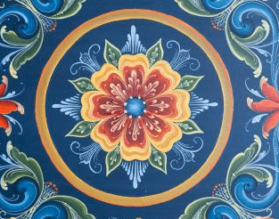 Orange and yellow flowers painted in a round motif